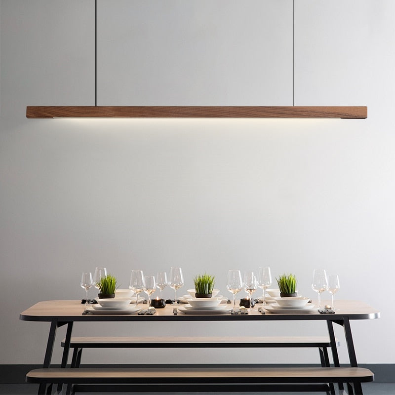 Lights of Scandinavia - Lind - Modern long hanging dining room pendant light ala Nordic style. Will also make a good fit for office areas, restaurants and bars. Pine wood or black walnut Use the included remote to change color temperature between cold, neutral and warm light.